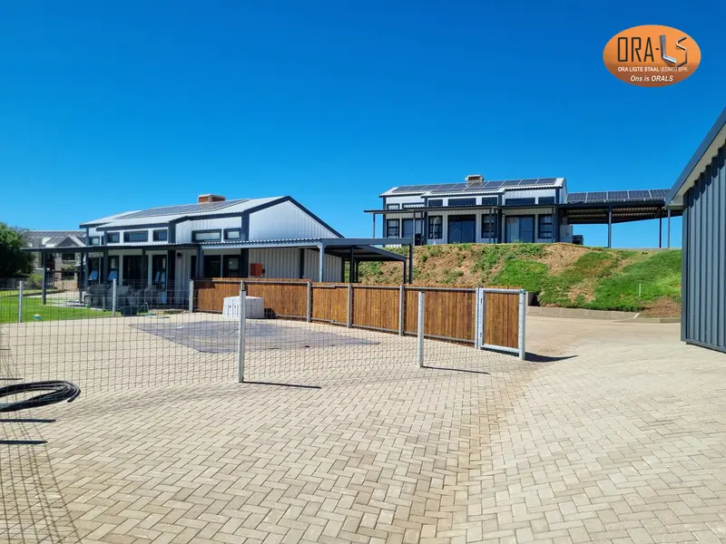 Residential house completed using ORALS-supplied structural systems and materials