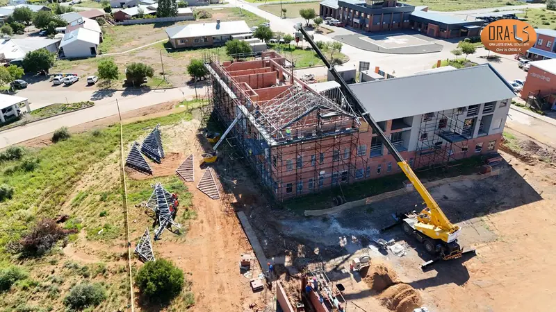 Commercial building roof using ORALS-supplied structural systems and materials
