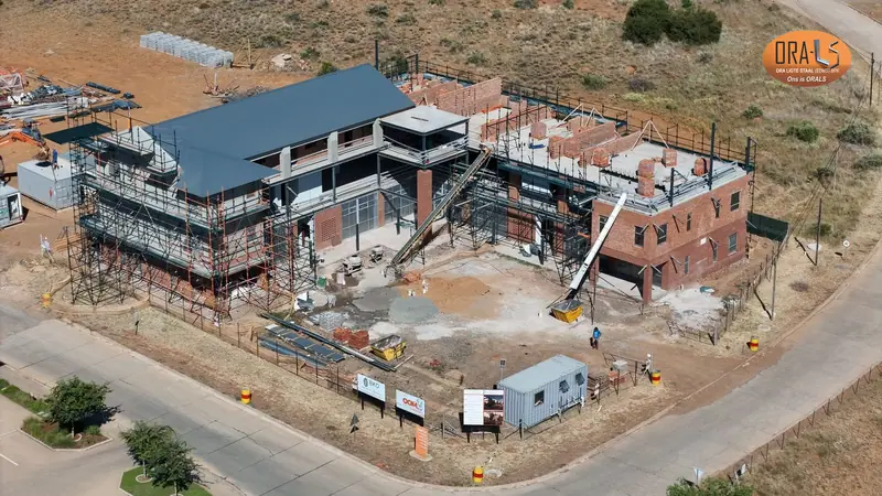 Commercial building roof using ORALS-supplied structural systems and materials