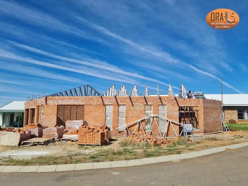 Residential house roof trusses using ORALS-supplied structural systems and materials